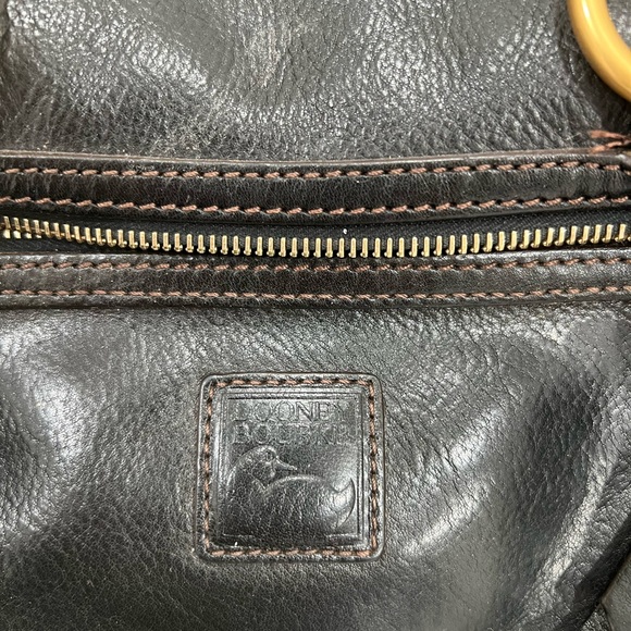 Beautiful Dooney & Bourke with Double Pockets.
Comes with crossbody strap. - Picture 6 of 9